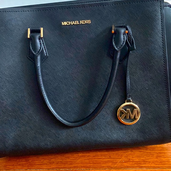 Black and gold Michael Kors bag
